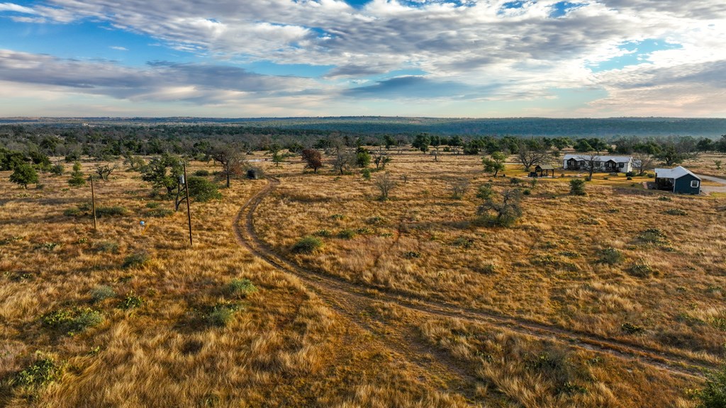 875 Old Harper Road Harper, TX 78631 - Photo 10 of 42 an aerial view of residential building with yard and ocean view