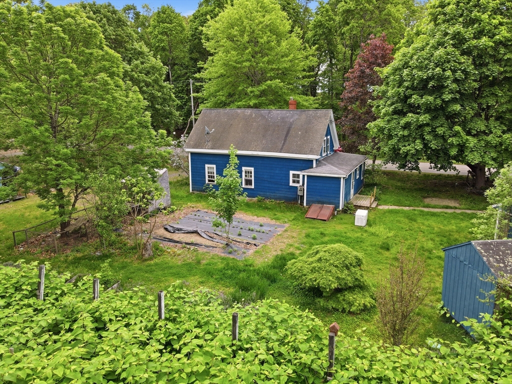200 Stockbridge Road Scituate, MA 02066 - Photo 6 of 14 front view of a house with a yard