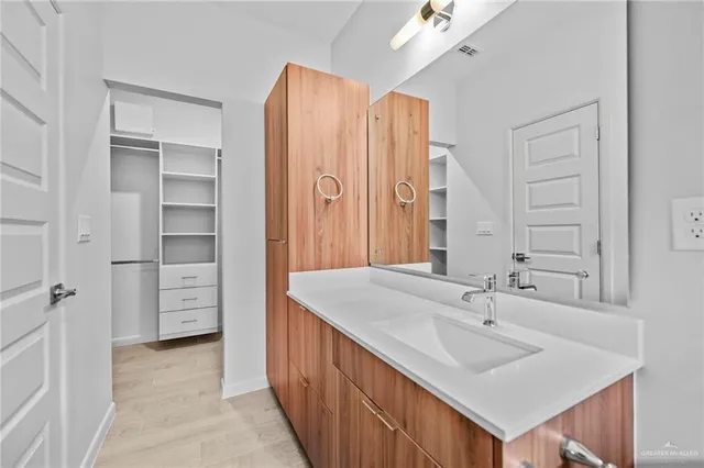 a view of an empty walk in closet