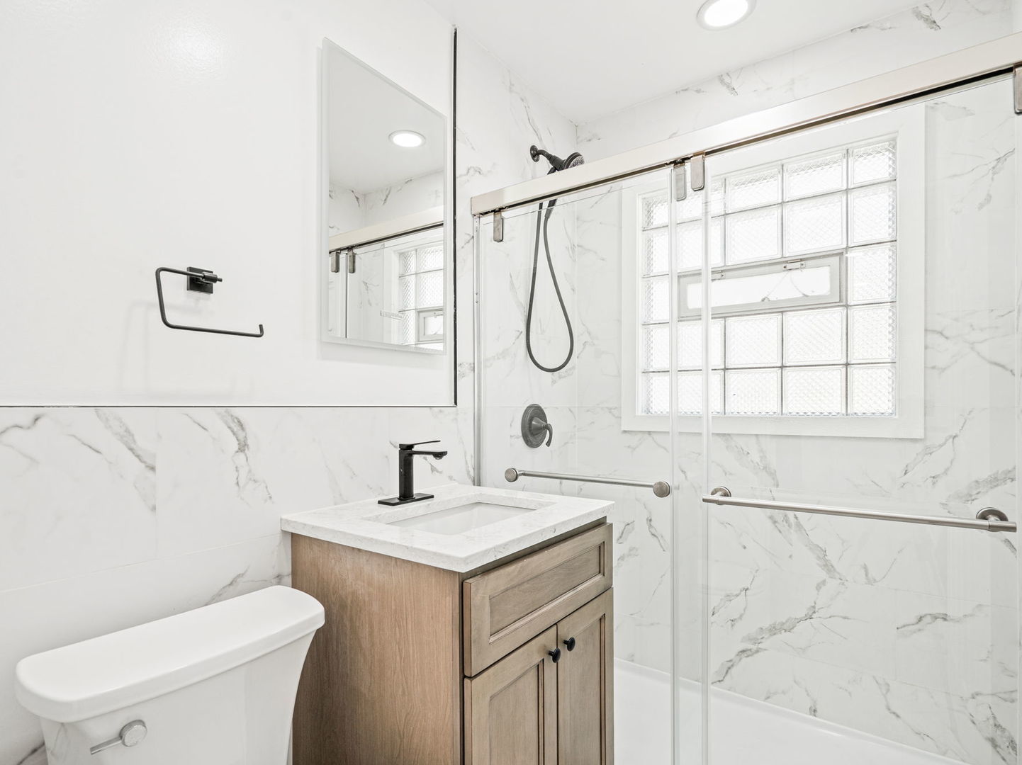 3824 Sunset Avenue Markham, IL 60428 - Photo 10 of 15 a bathroom with a sink a toilet and shower