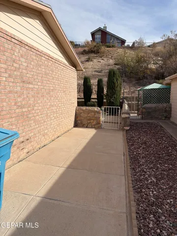 a view of a house with a street