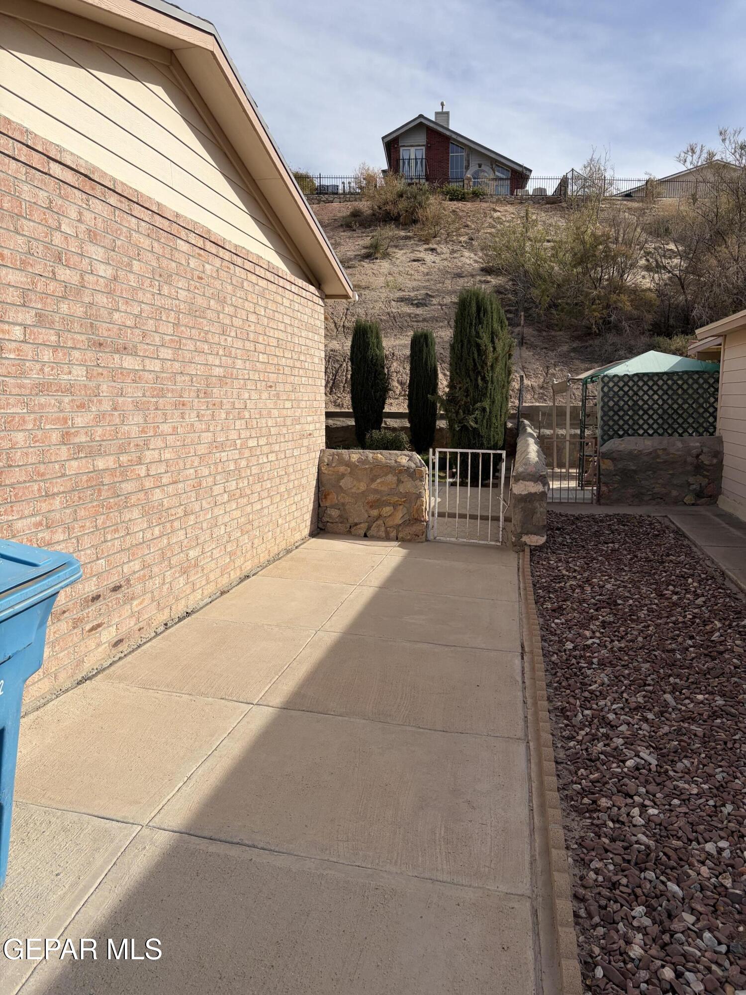 10735 Thunder Road El Paso, TX 79927 - Photo 27 of 32 a view of a terrace with furniture