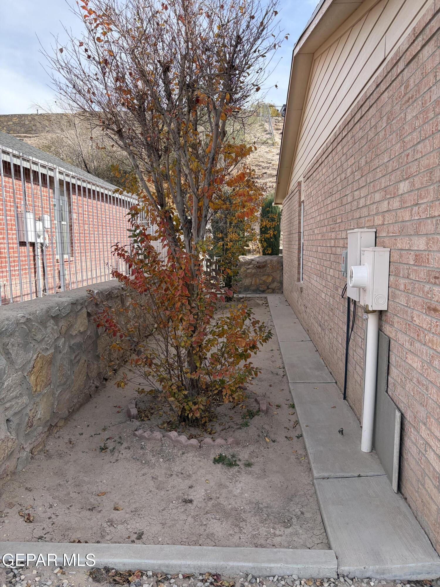 10735 Thunder Road El Paso, TX 79927 - Photo 32 of 32 a view of a pathway of a house