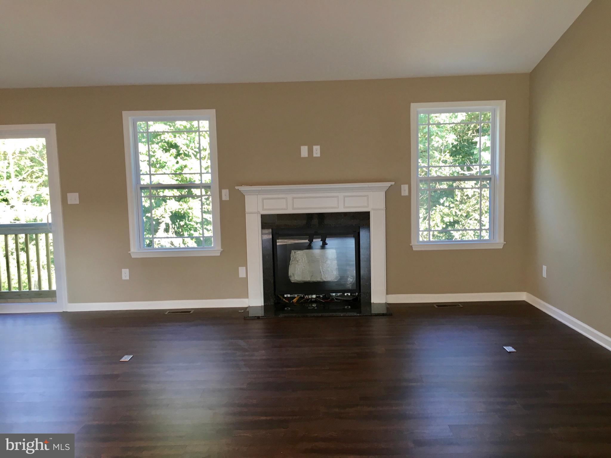 21 Dimension Road Inwood, WV 25428 - Photo 8 of 13 Great Room with gas fireplace