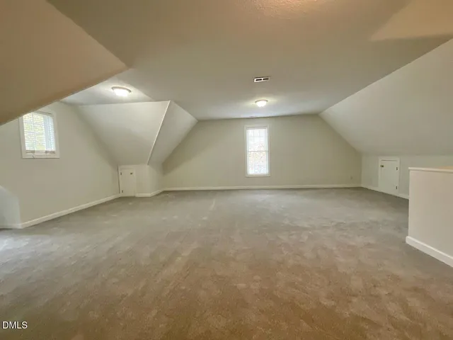 a view of swimming pool with an outdoor space and seating area