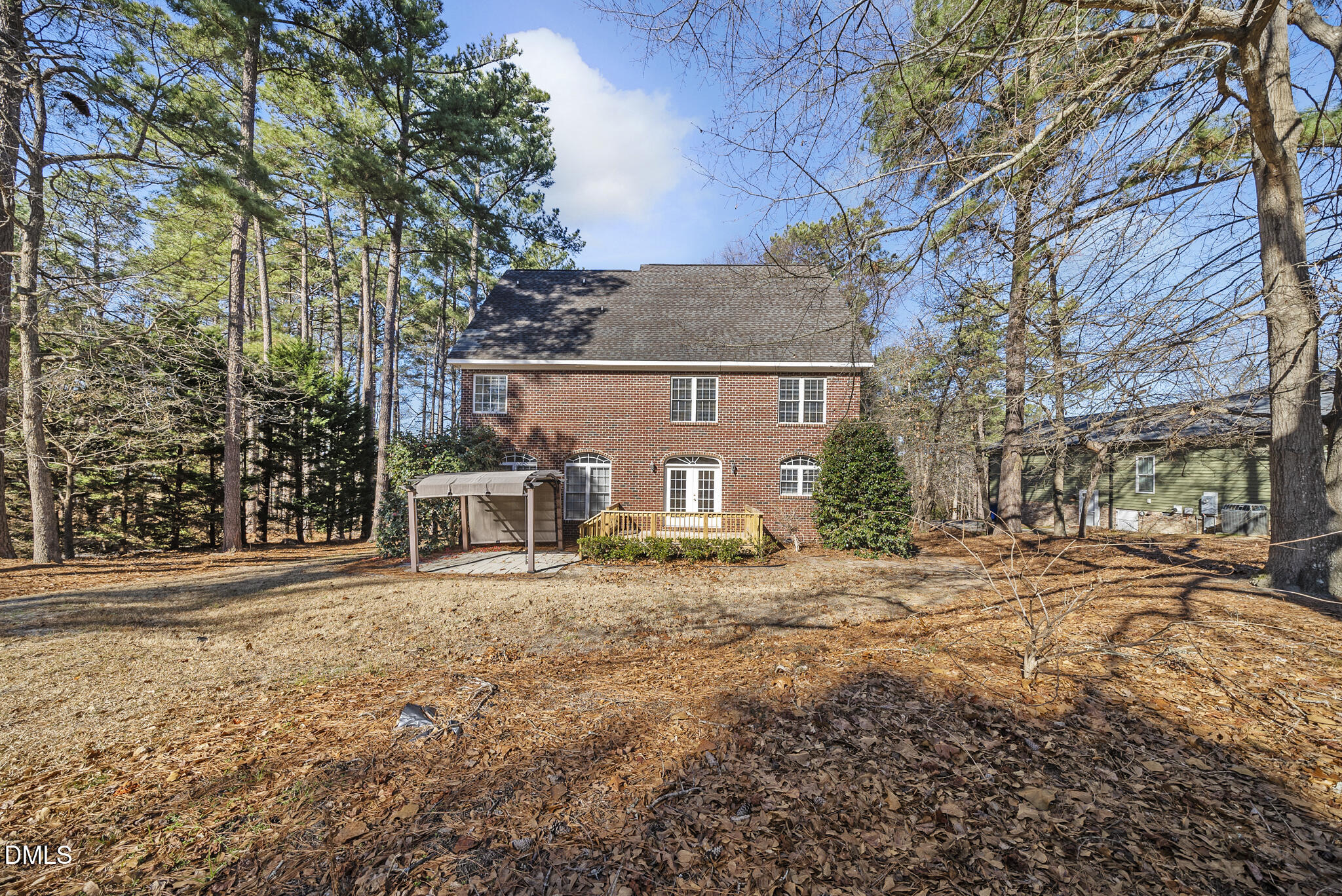 5833 Mockingbird Lane Sanford, NC 27332 - Photo 4 of 34 a view of a house with a yard