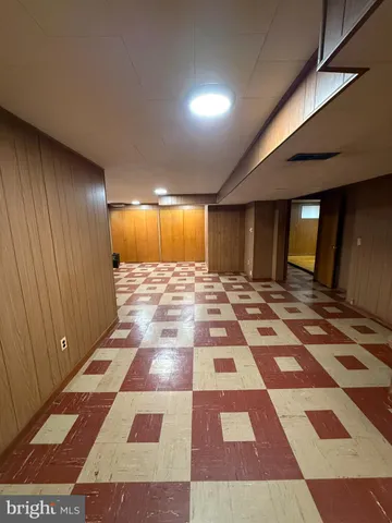a view of bathroom with a black and white checkered floor