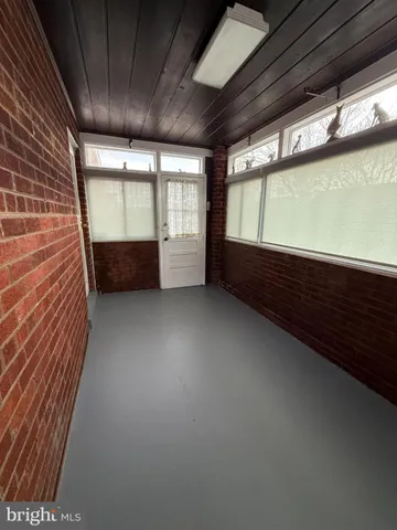 a backyard of a house with seating space