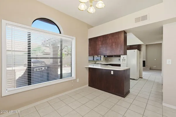 a bathroom with a shower and a sink