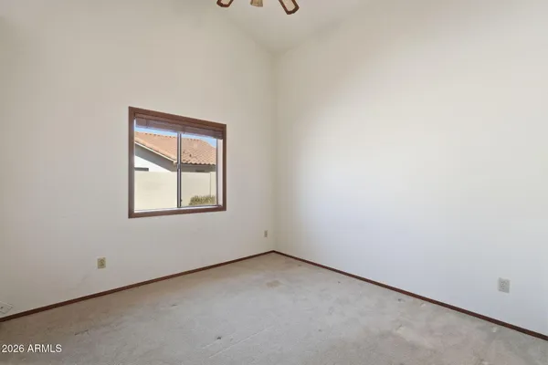 a bathroom with a shower and a toilet