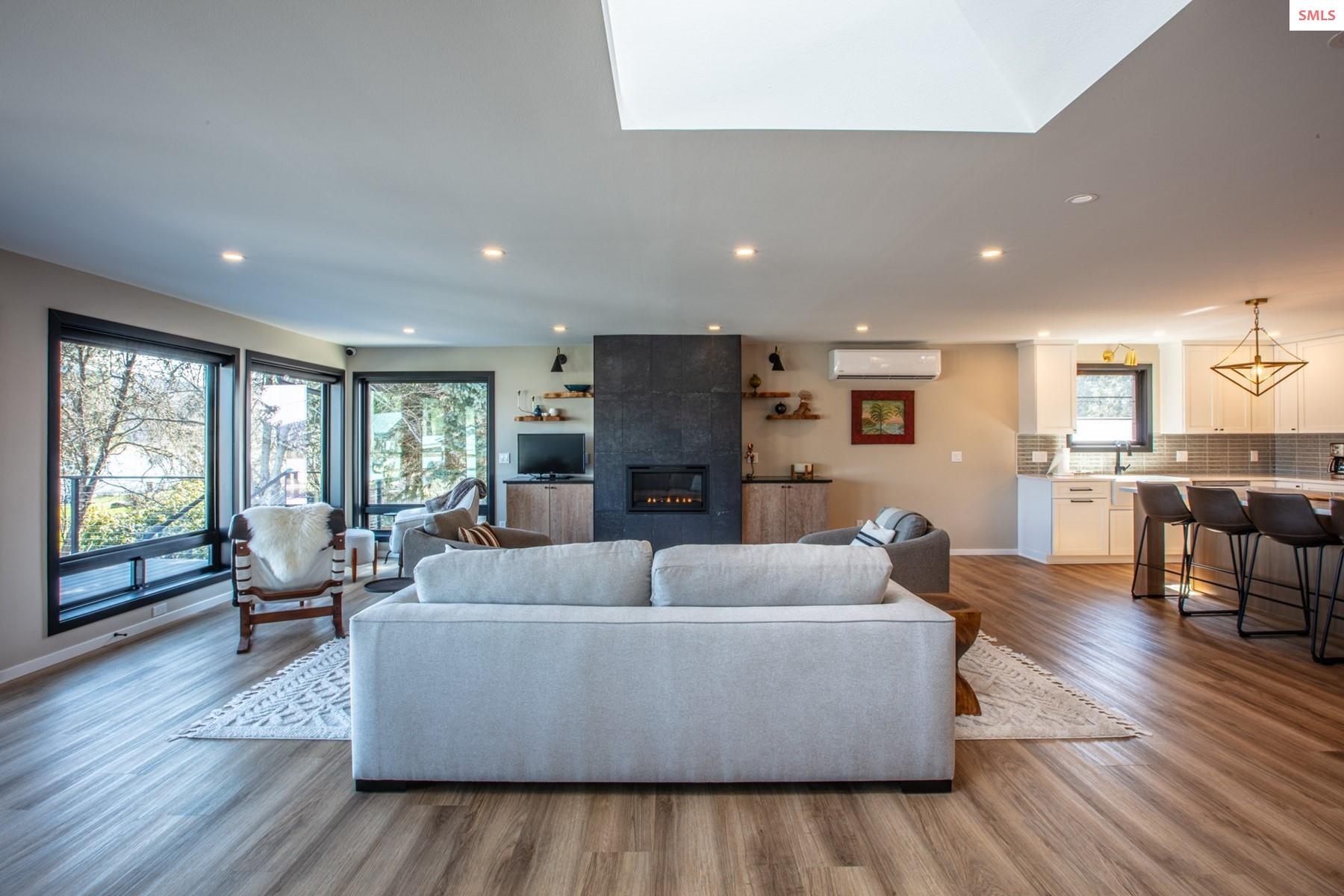 475 Campbell Point Road Laclede, ID 83841 - Photo 10 of 66 Enjoy the warmth and ambiance from the gas fireplace. Floating shelves to display your favorites