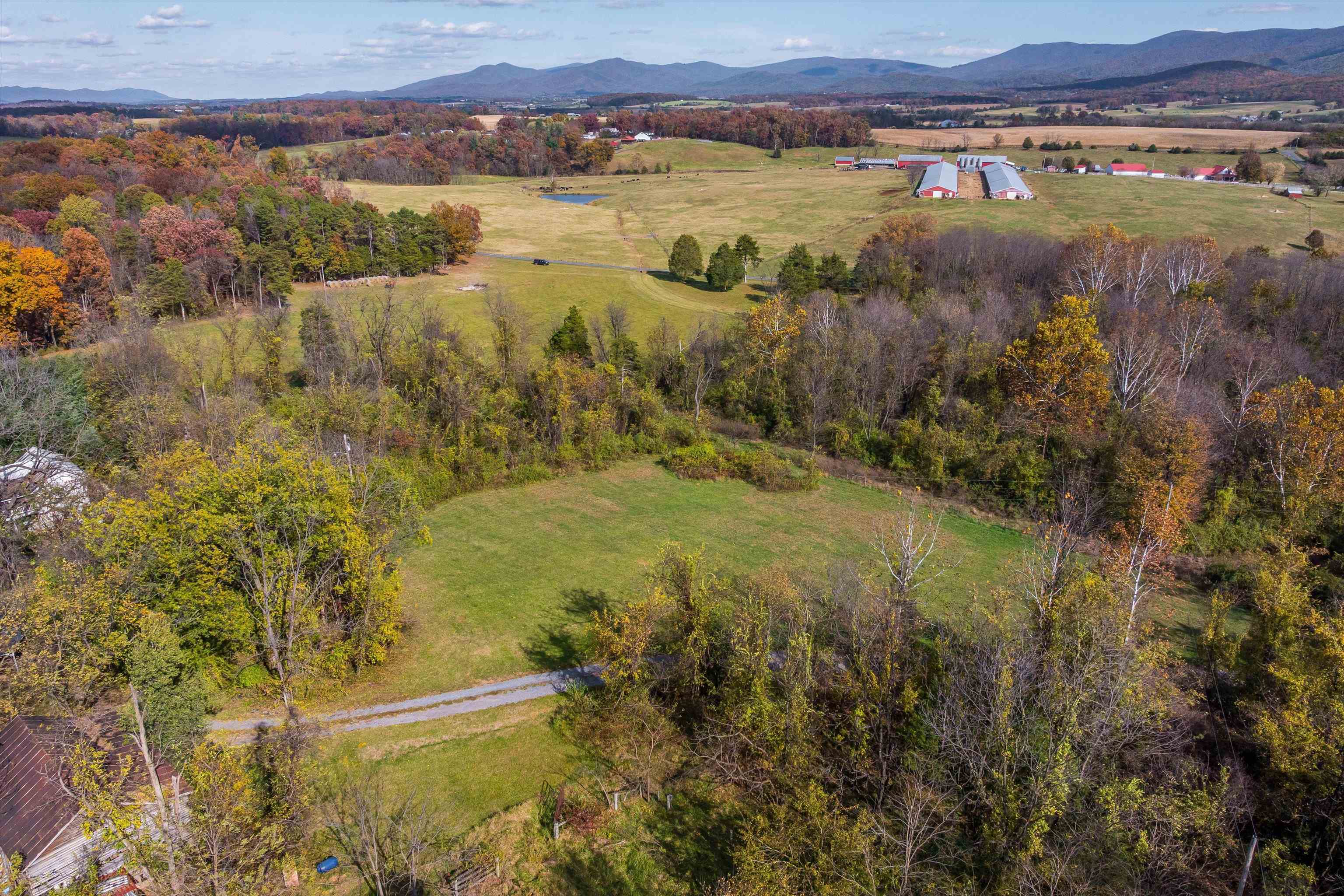 326-328 Running Pine Road Luray, VA 22835 - Photo 5 of 22 a view of a lake with mountains in the background