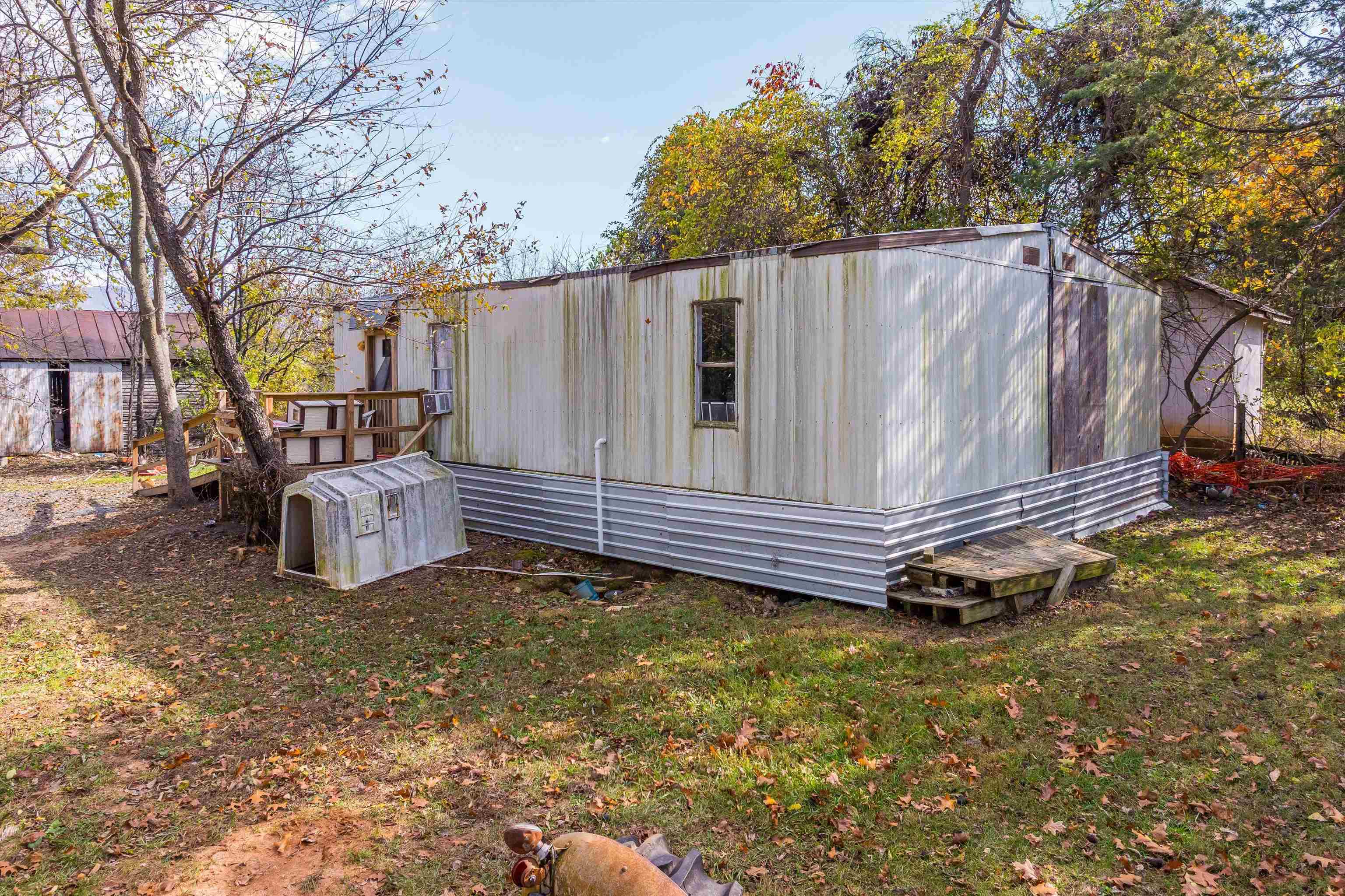 326-328 Running Pine Road Luray, VA 22835 - Photo 8 of 22 a view of a backyard with a small cabin