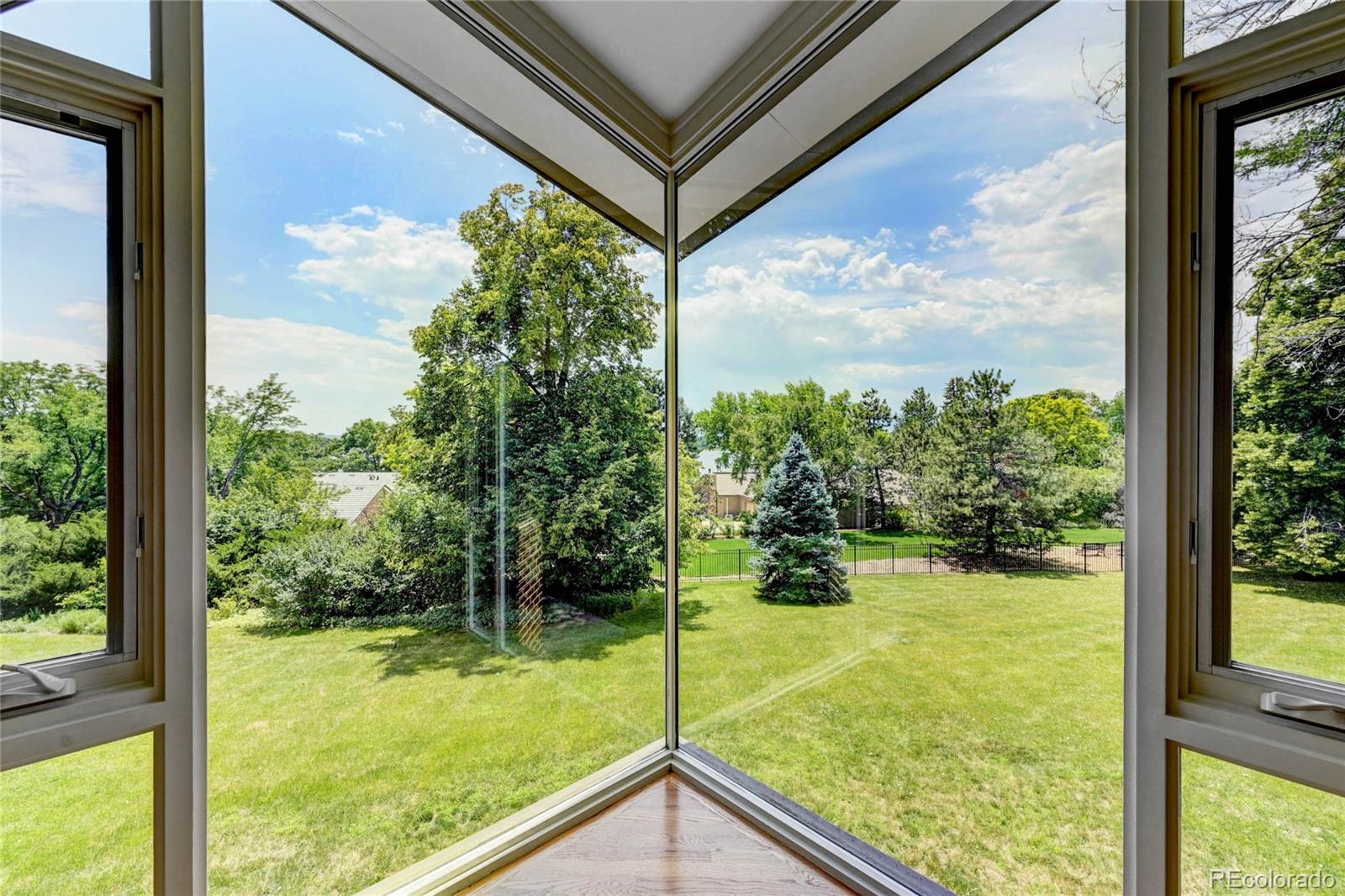 5140 Juniper Street Bow Mar, CO 80123 - Photo 24 of 40 a view of a garden from a window