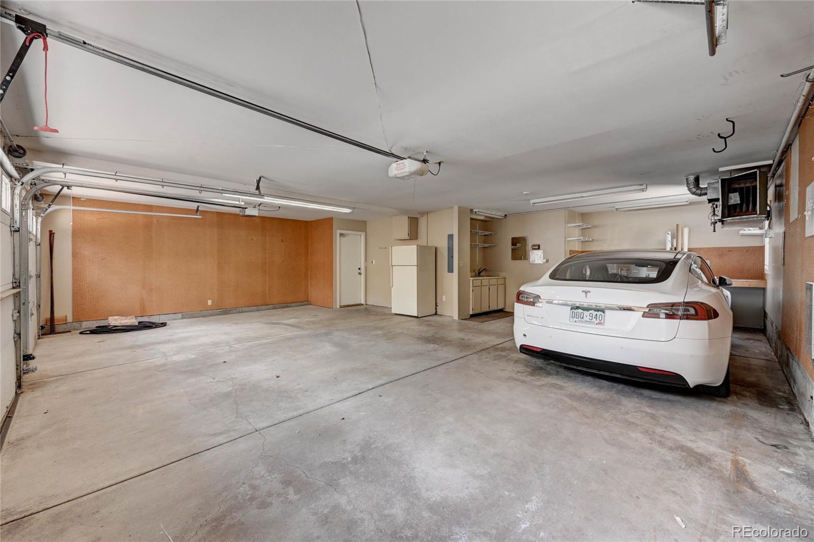 5140 Juniper Street Bow Mar, CO 80123 - Photo 35 of 40 a car parked in garage