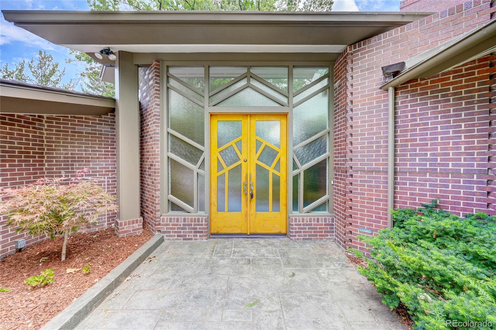 5140 Juniper Street Bow Mar, CO 80123 - Photo 4 of 40 a view of entrance gate of a house