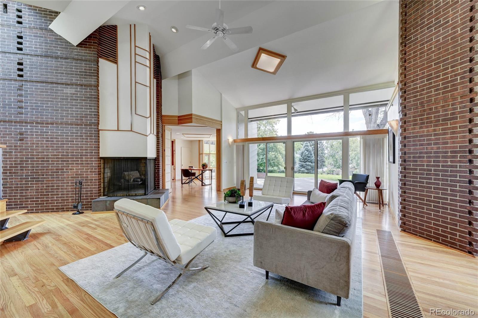 5140 Juniper Street Bow Mar, CO 80123 - Photo 10 of 40 a living room with furniture and a large window