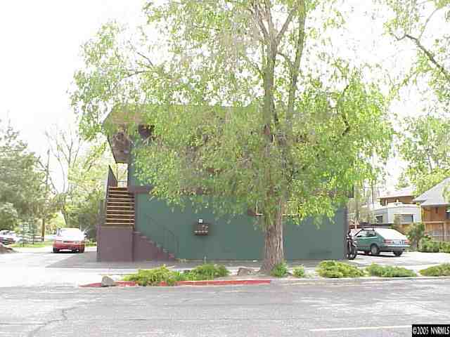 802 Lander Street, Unit 4 Reno, NV 89509 - Photo 1 of 1 a street view with large trees