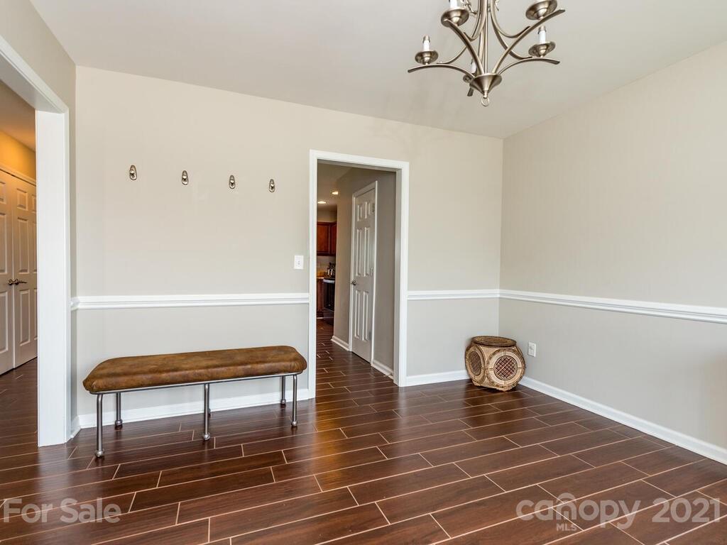 20 Roanoke Road Fletcher, NC 28732 - Photo 14 of 36 a view of room with furniture and wooden floor