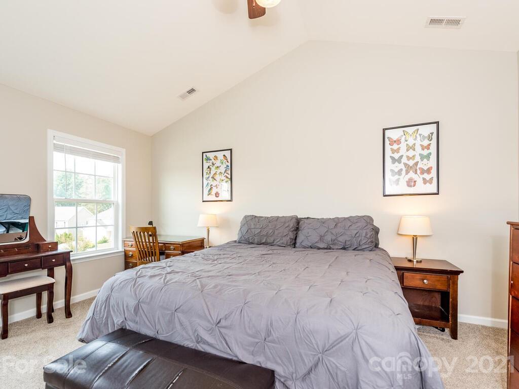 20 Roanoke Road Fletcher, NC 28732 - Photo 18 of 36 a bedroom with a bed and a window