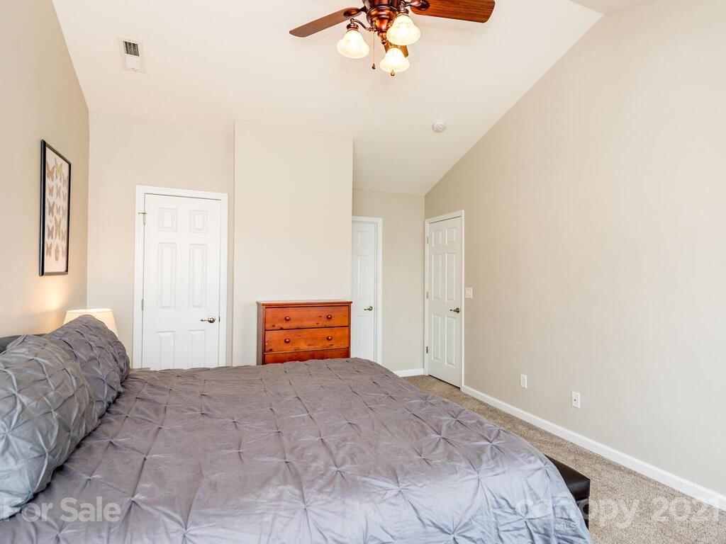 20 Roanoke Road Fletcher, NC 28732 - Photo 19 of 36 a bedroom with bed and window