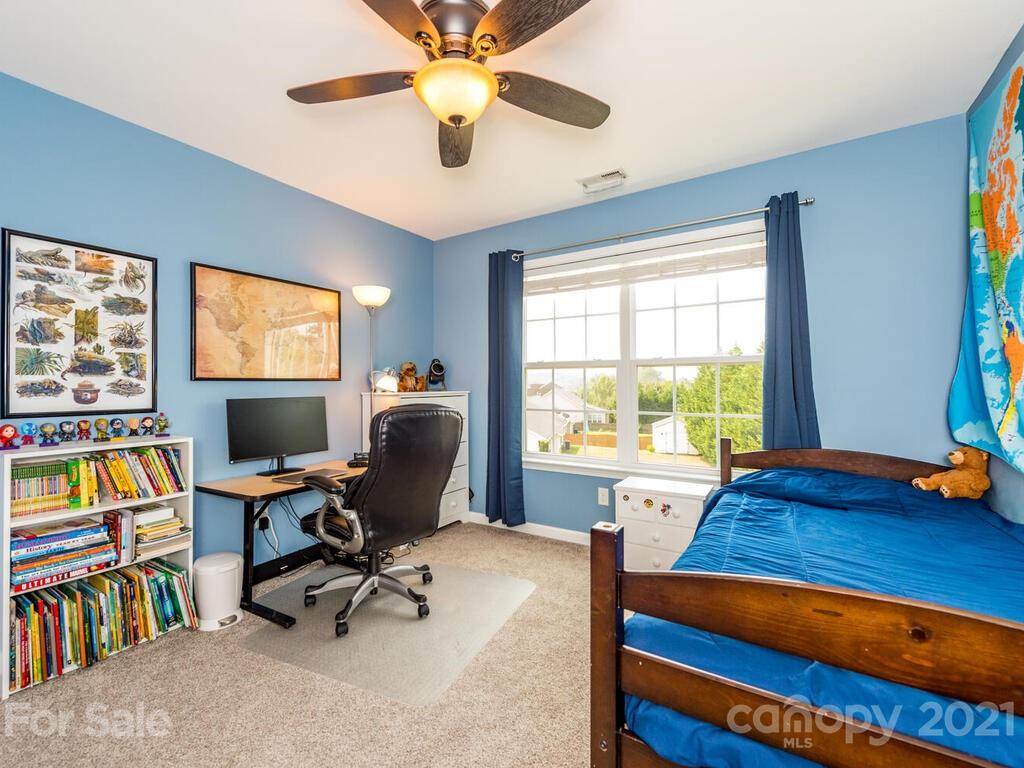 20 Roanoke Road Fletcher, NC 28732 - Photo 24 of 36 a view of a workspace with furniture and a window