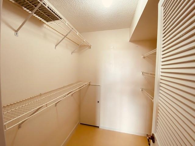 9420 South Hollybrook Lake Drive, Unit 305 Pembroke Pines, FL 33025 - Photo 11 of 16 a view of a room with racks on the wall