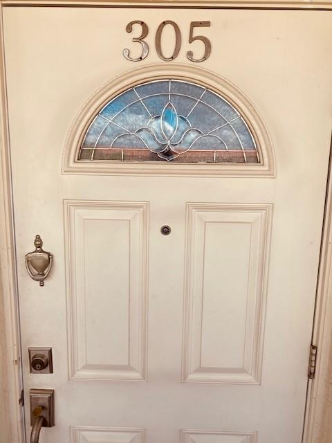 9420 South Hollybrook Lake Drive, Unit 305 Pembroke Pines, FL 33025 - Photo 15 of 16 a close view of door lock