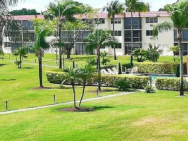 a view of a park with chairs