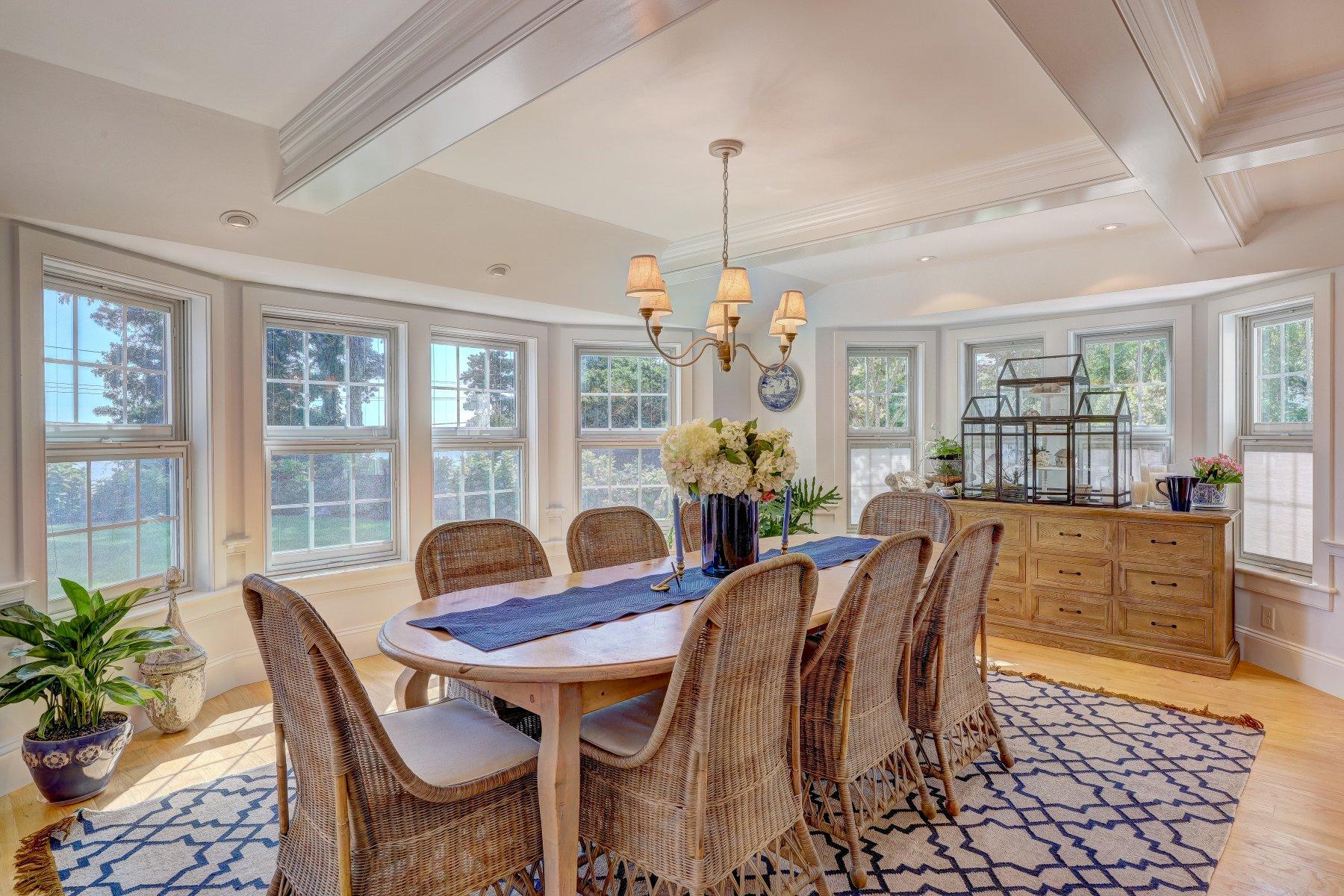 646 South Orleans Road Orleans, MA 02653 - Photo 15 of 43 a view of a dining room with furniture window and wooden floor