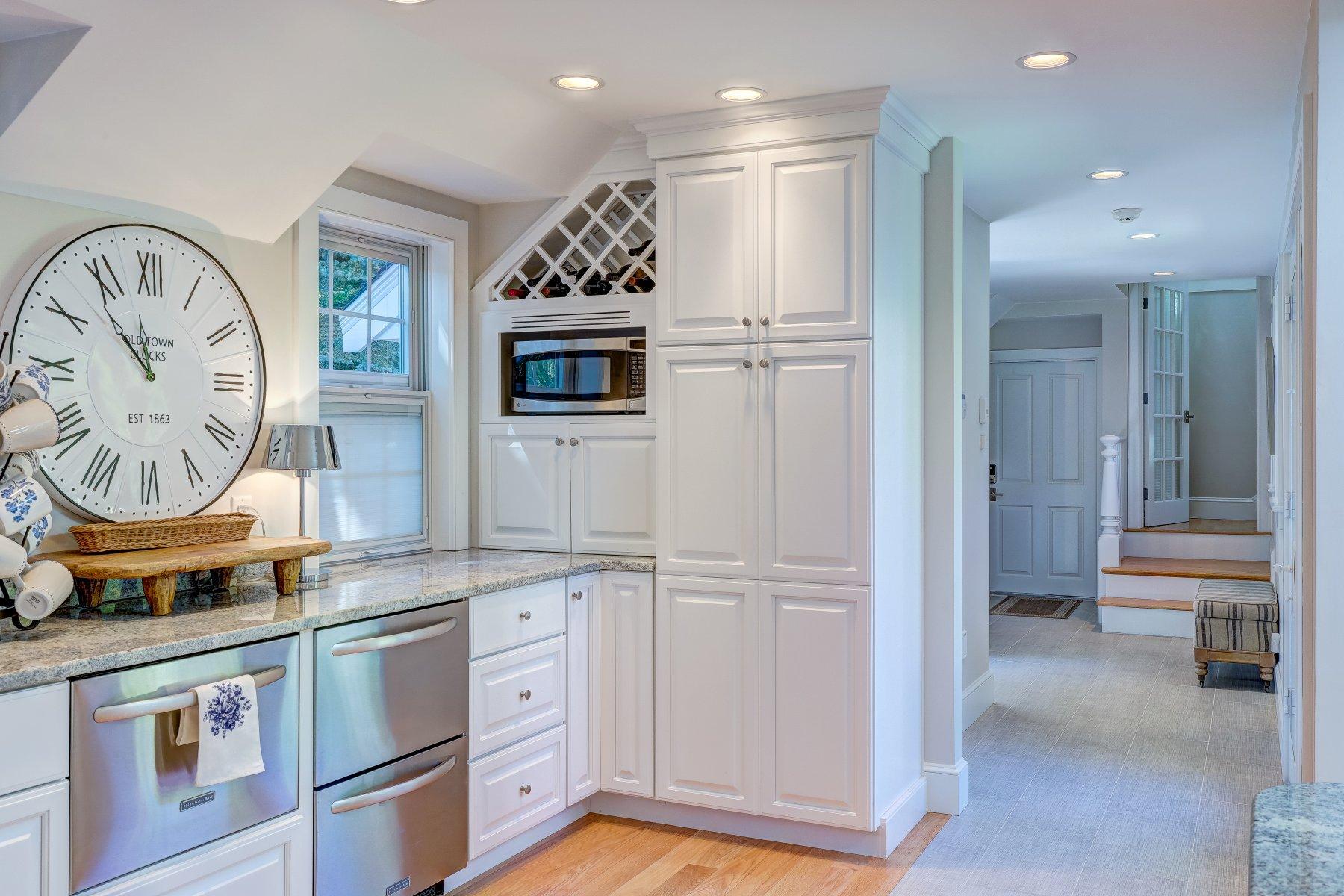 646 South Orleans Road Orleans, MA 02653 - Photo 18 of 43 a kitchen with stainless steel appliances granite countertop a refrigerator and a stove