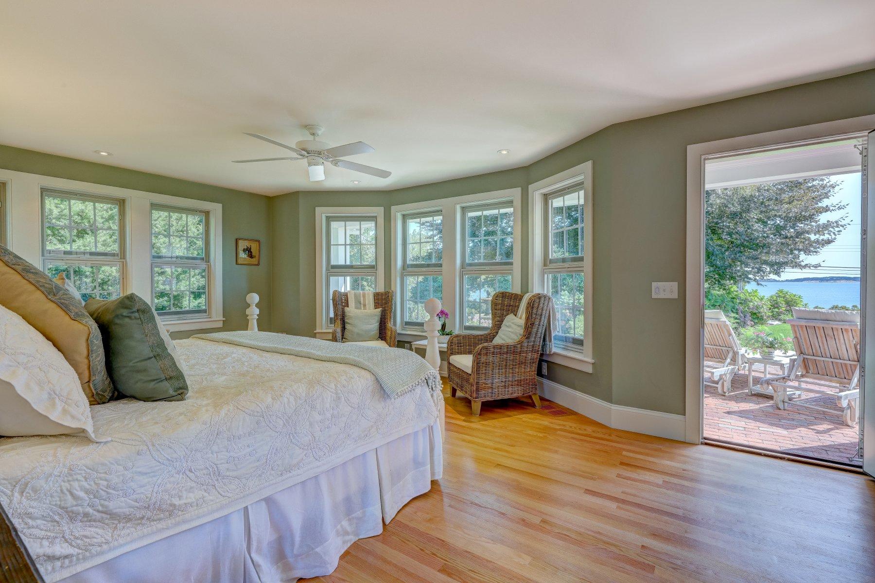 646 South Orleans Road Orleans, MA 02653 - Photo 22 of 43 a spacious bedroom with a bed and wooden floor