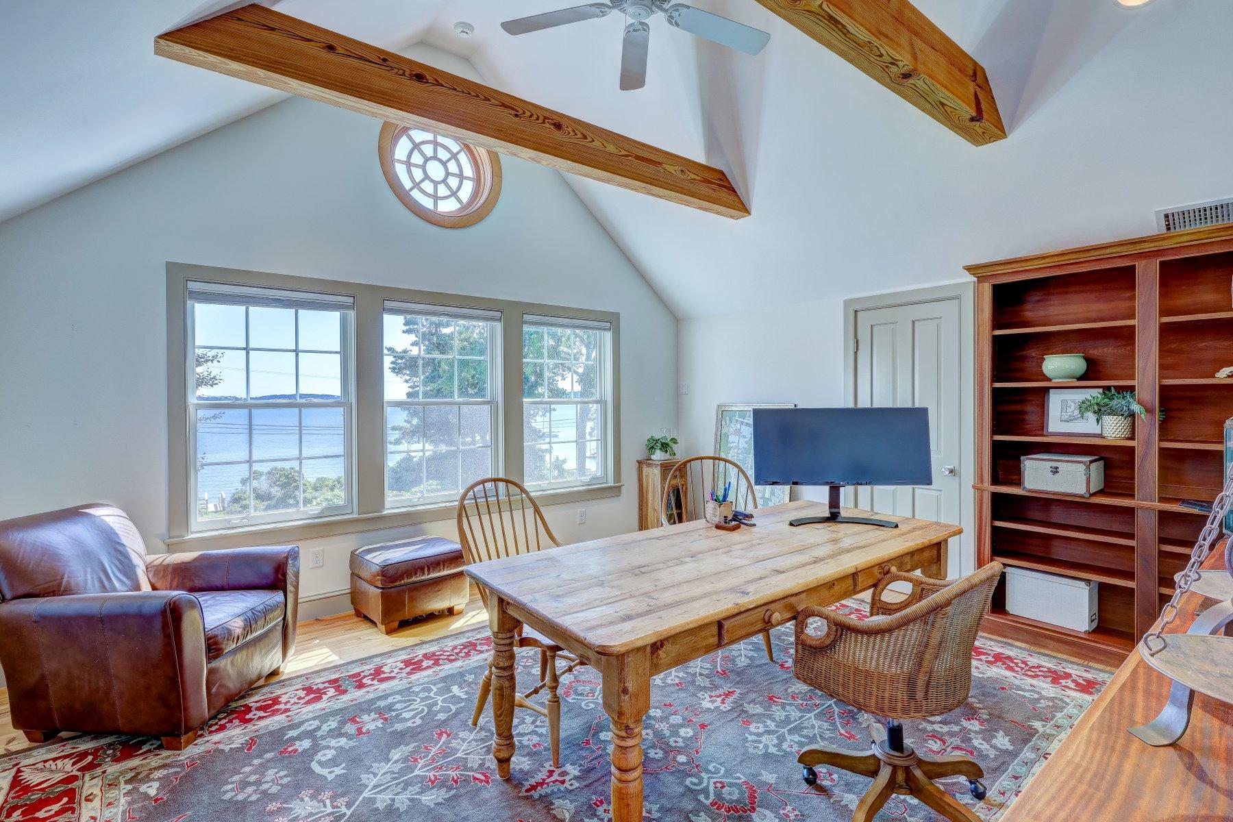 646 South Orleans Road Orleans, MA 02653 - Photo 27 of 43 a view of a dining room with furniture window and wooden floor