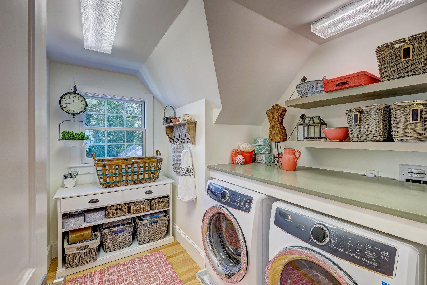 646 South Orleans Road Orleans, MA 02653 - Photo 28 of 43 a storage room with washer and dryer