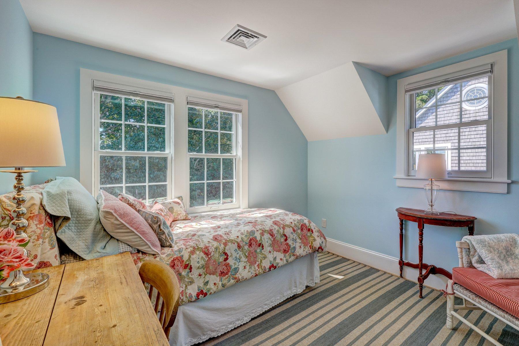 646 South Orleans Road Orleans, MA 02653 - Photo 30 of 43 a bedroom with a bed and a window