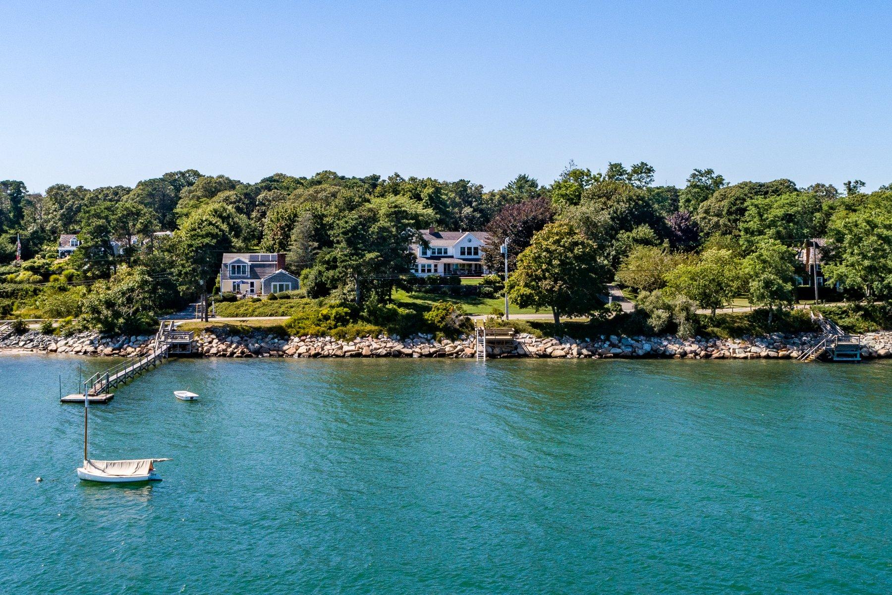 646 South Orleans Road Orleans, MA 02653 - Photo 3 of 43 an aerial view of residential houses with outdoor space and lake view