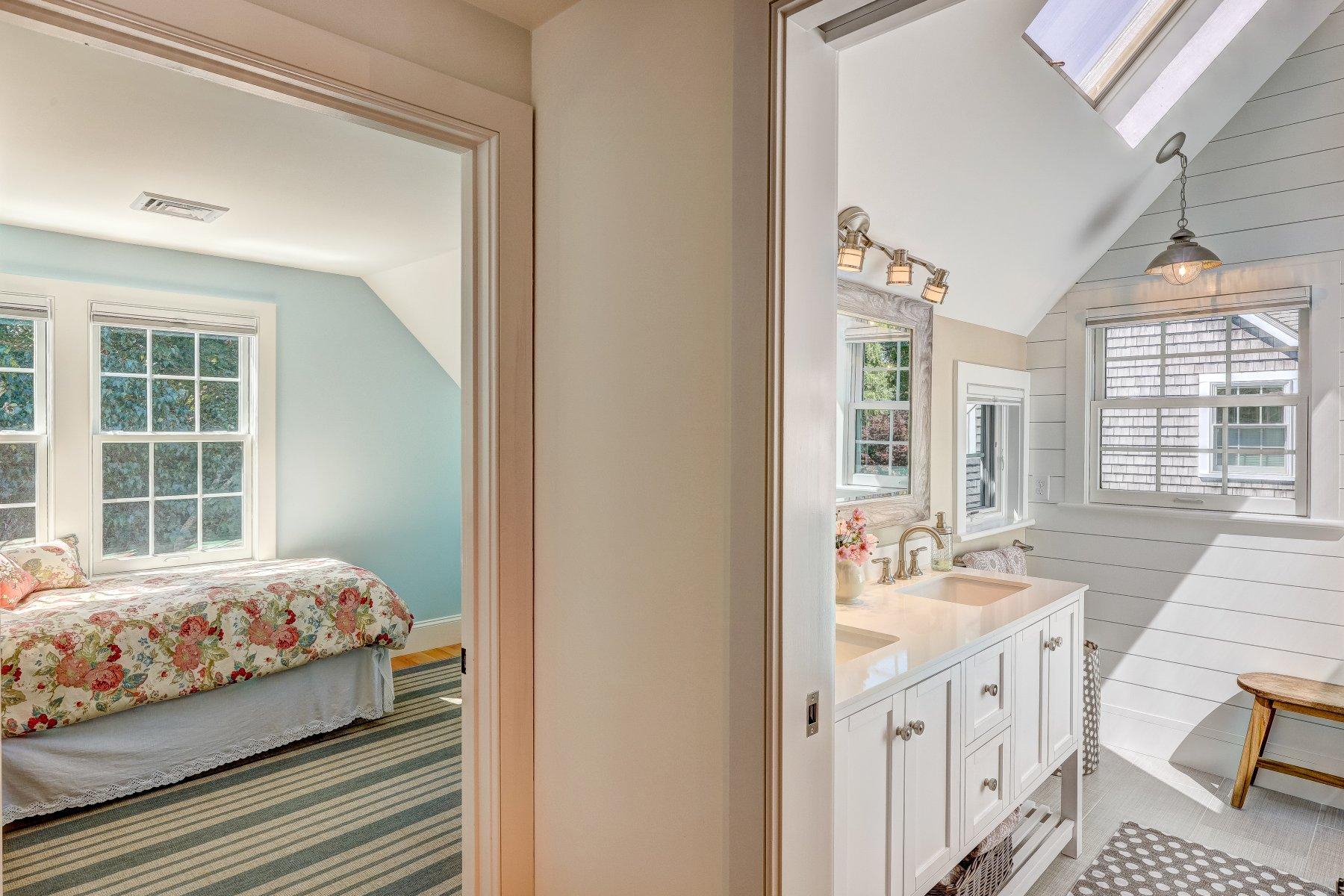 646 South Orleans Road Orleans, MA 02653 - Photo 31 of 43 a bedroom with bed and a large window