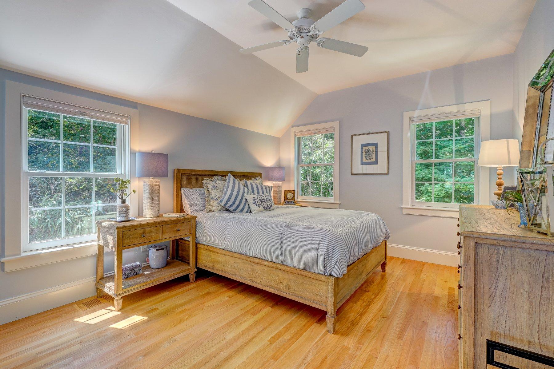 646 South Orleans Road Orleans, MA 02653 - Photo 38 of 43 a bedroom with a bed and a large window