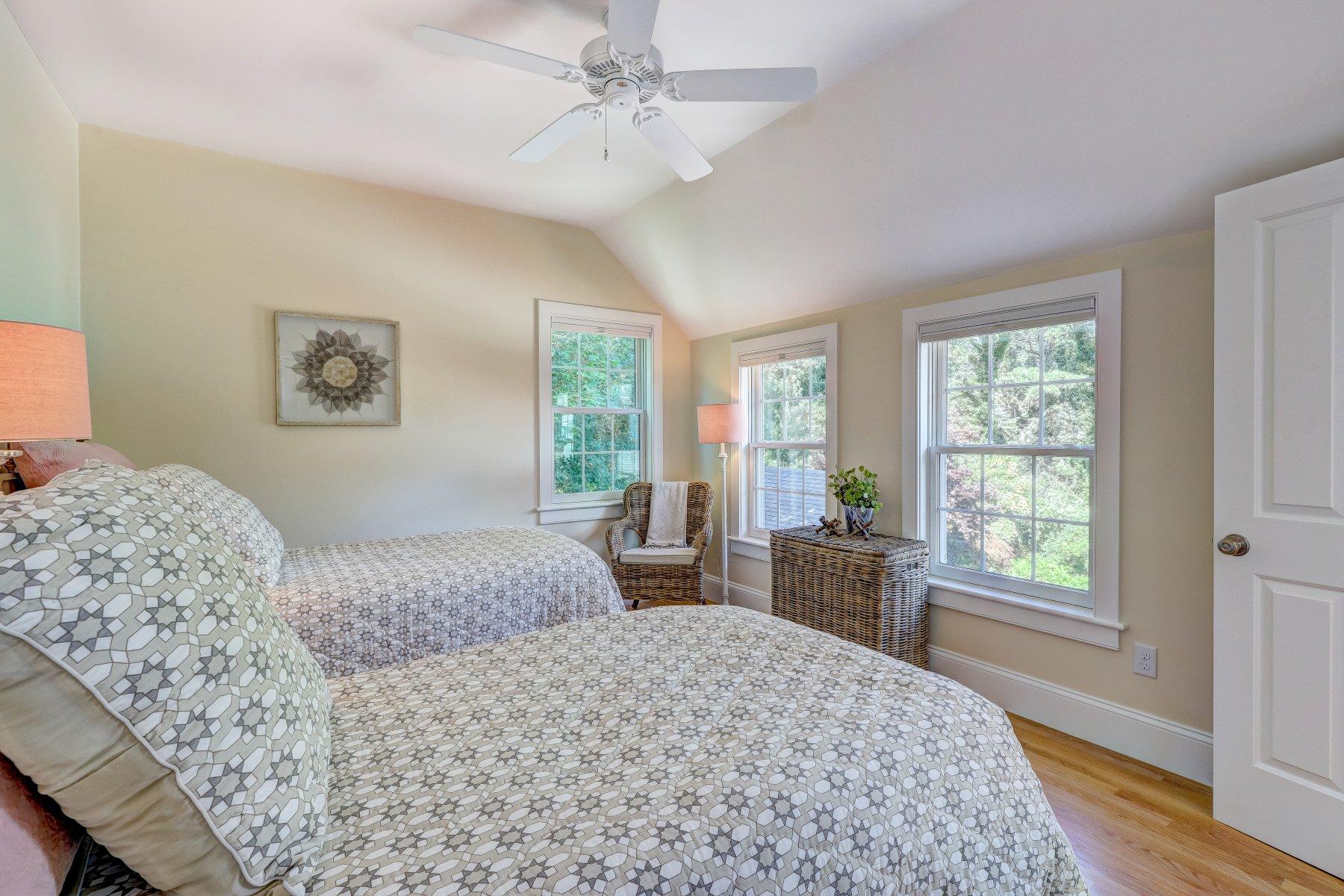646 South Orleans Road Orleans, MA 02653 - Photo 39 of 43 a bedroom with a large bed and a window