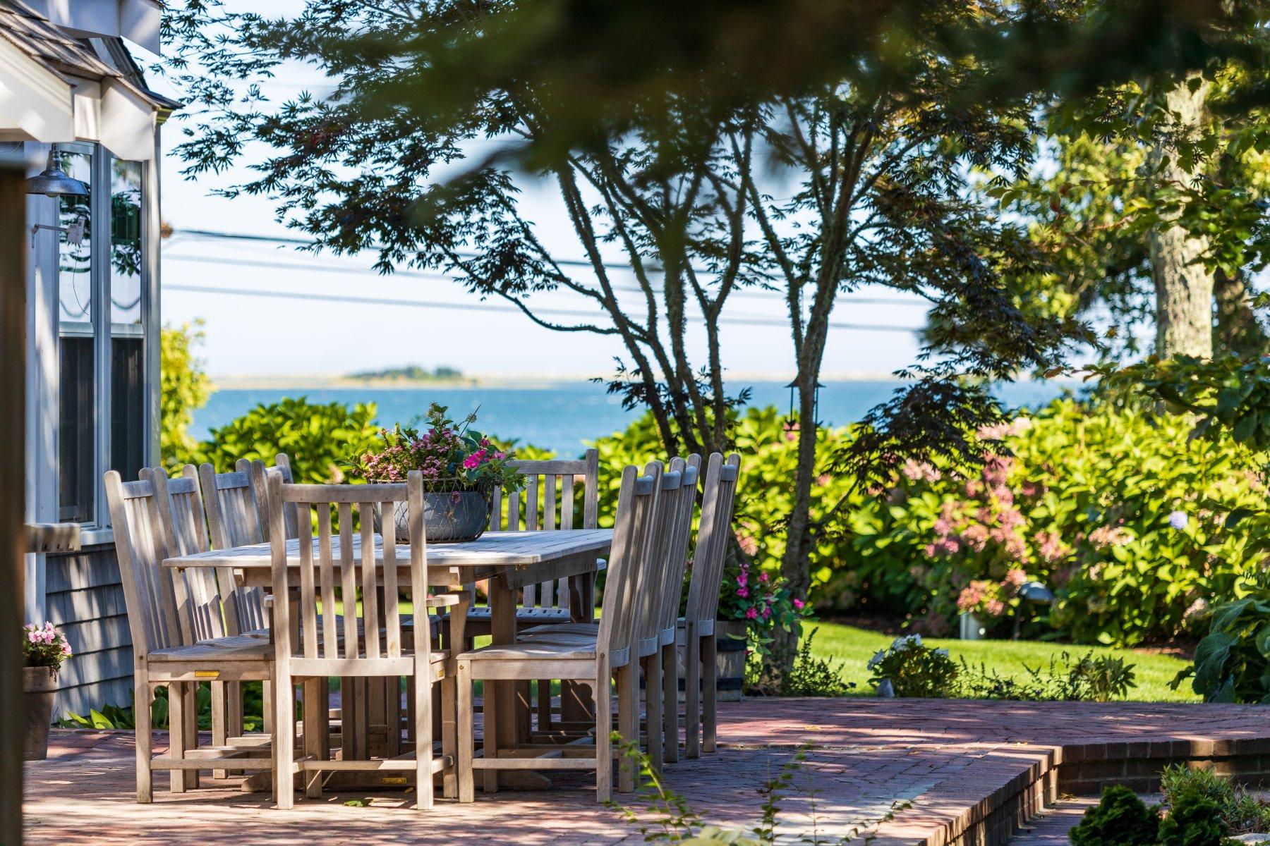 646 South Orleans Road Orleans, MA 02653 - Photo 41 of 43 a front view of a building with tree s