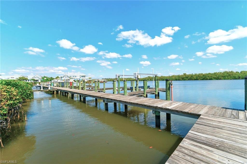 305 Goodlette-Frank Road, Unit C204 Naples, FL 34102 - Photo 4 of 16 a view of a balcony with lake view