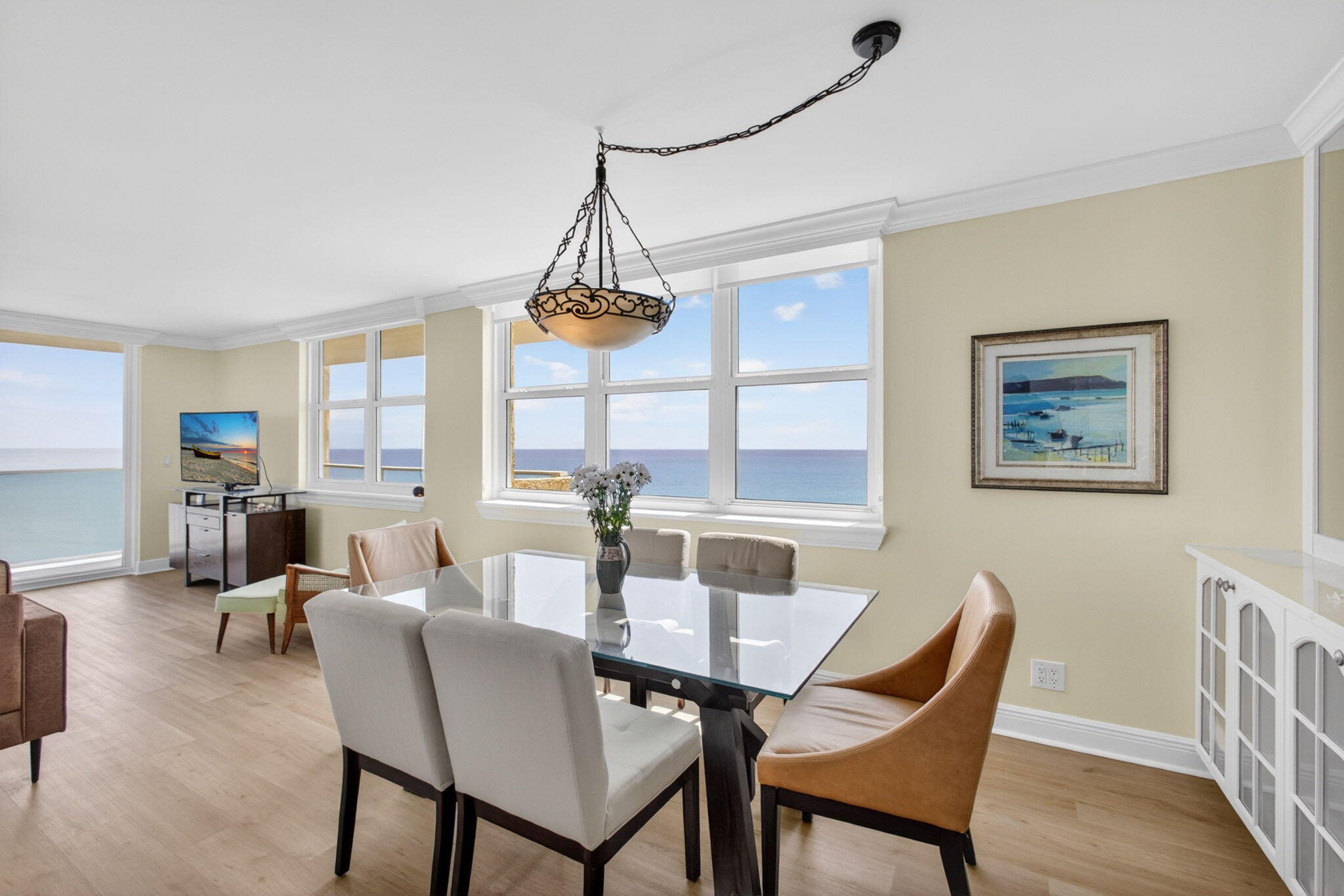 5440 North Ocean Drive, Unit 1006 Riviera Beach, FL 33404 - Photo 12 of 57 a view of a dining room with furniture