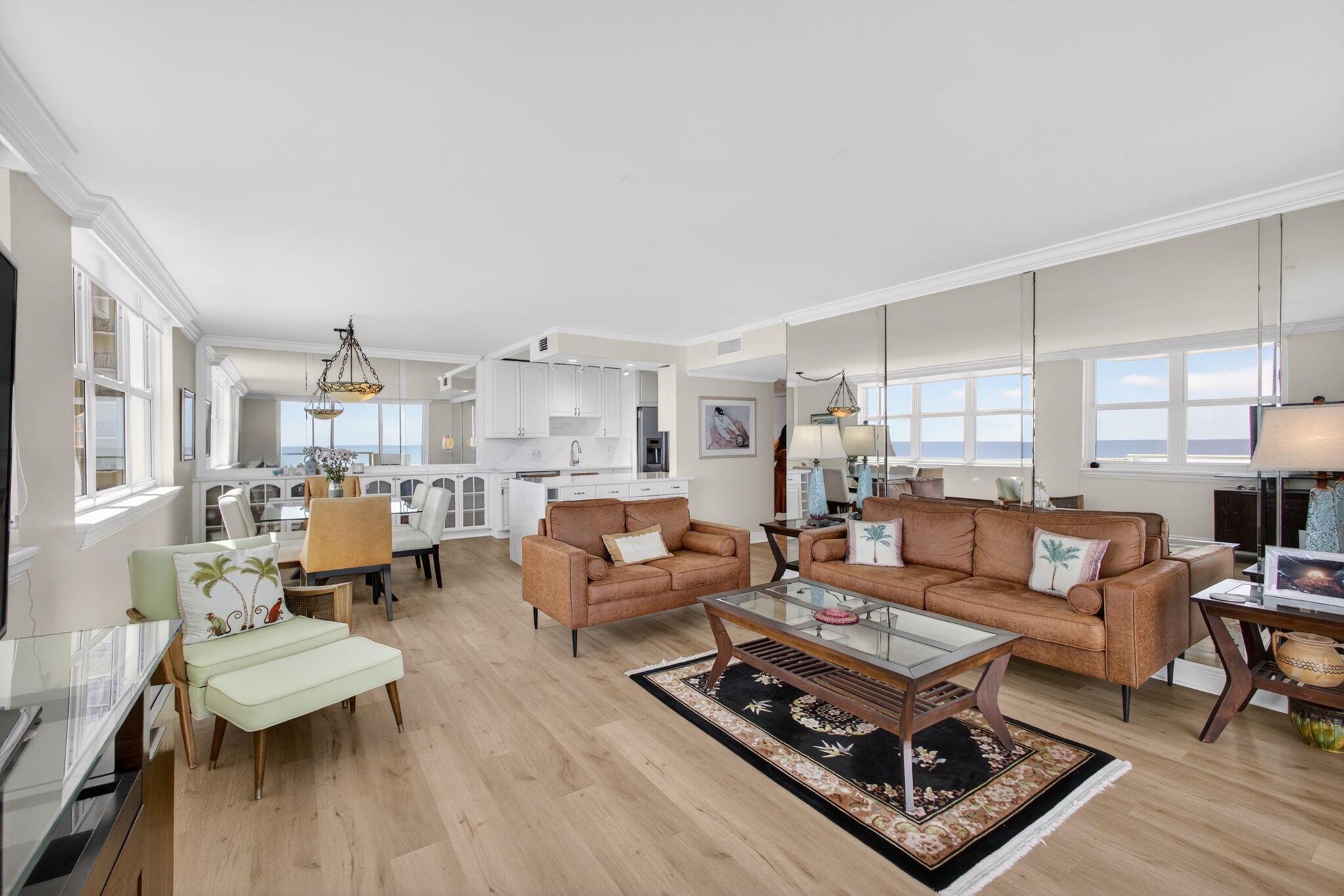 5440 North Ocean Drive, Unit 1006 Riviera Beach, FL 33404 - Photo 19 of 57 a living room with furniture and a wooden floor