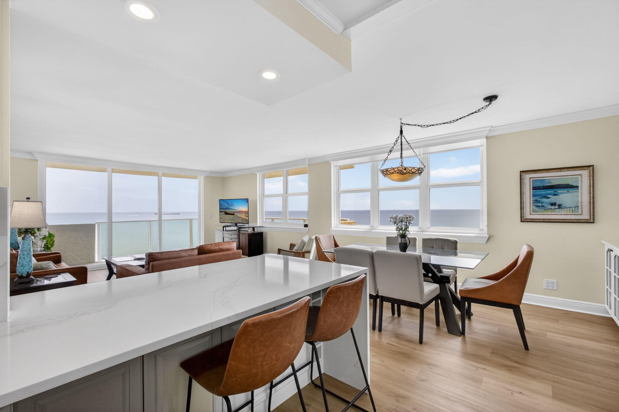 5440 North Ocean Drive, Unit 1006 Riviera Beach, FL 33404 - Photo 9 of 57 a view of a dining room with furniture window and outside view