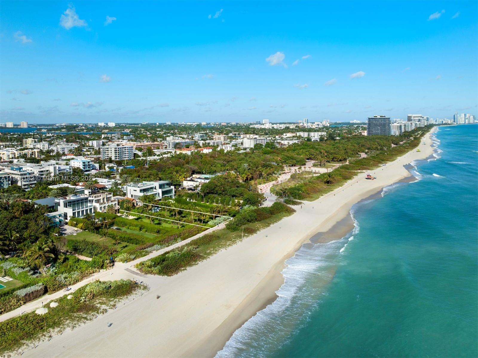 7837 Atlantic Way Miami Beach, FL 33141 - Photo 8 of 12 an aerial view of residential houses with outdoor space and trees