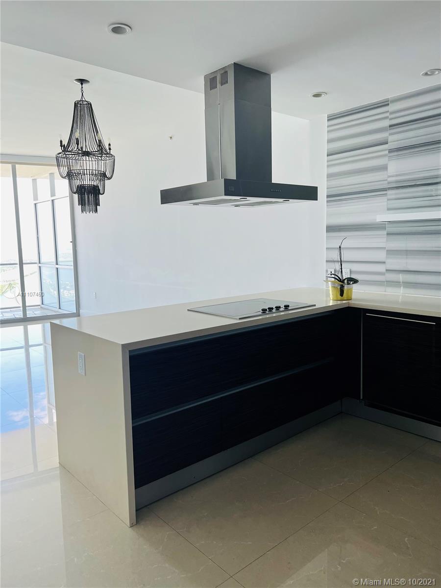 1100 Biscayne Boulevard, Unit 4504 Miami, FL 33132 - Photo 4 of 21 a view of kitchen with cabinets
