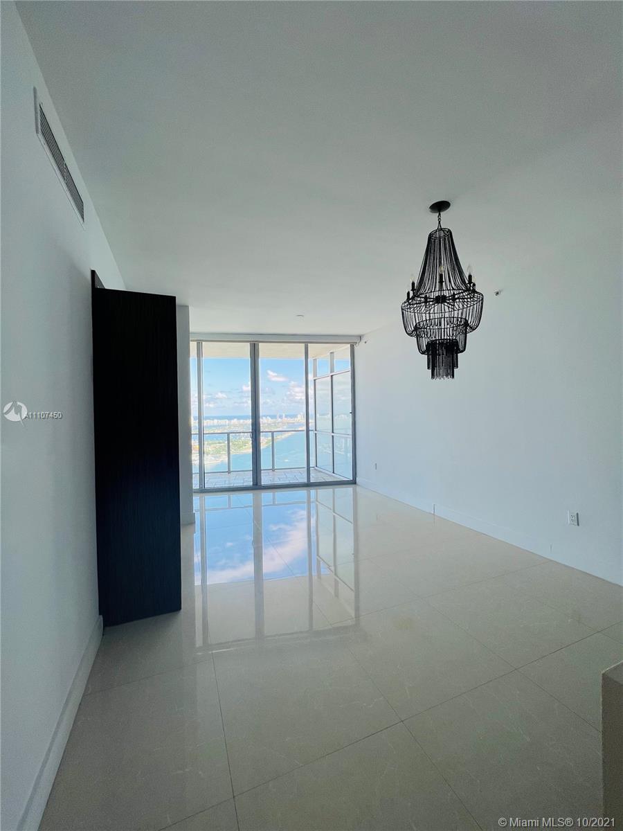 1100 Biscayne Boulevard, Unit 4504 Miami, FL 33132 - Photo 5 of 21 a view of empty room with windows