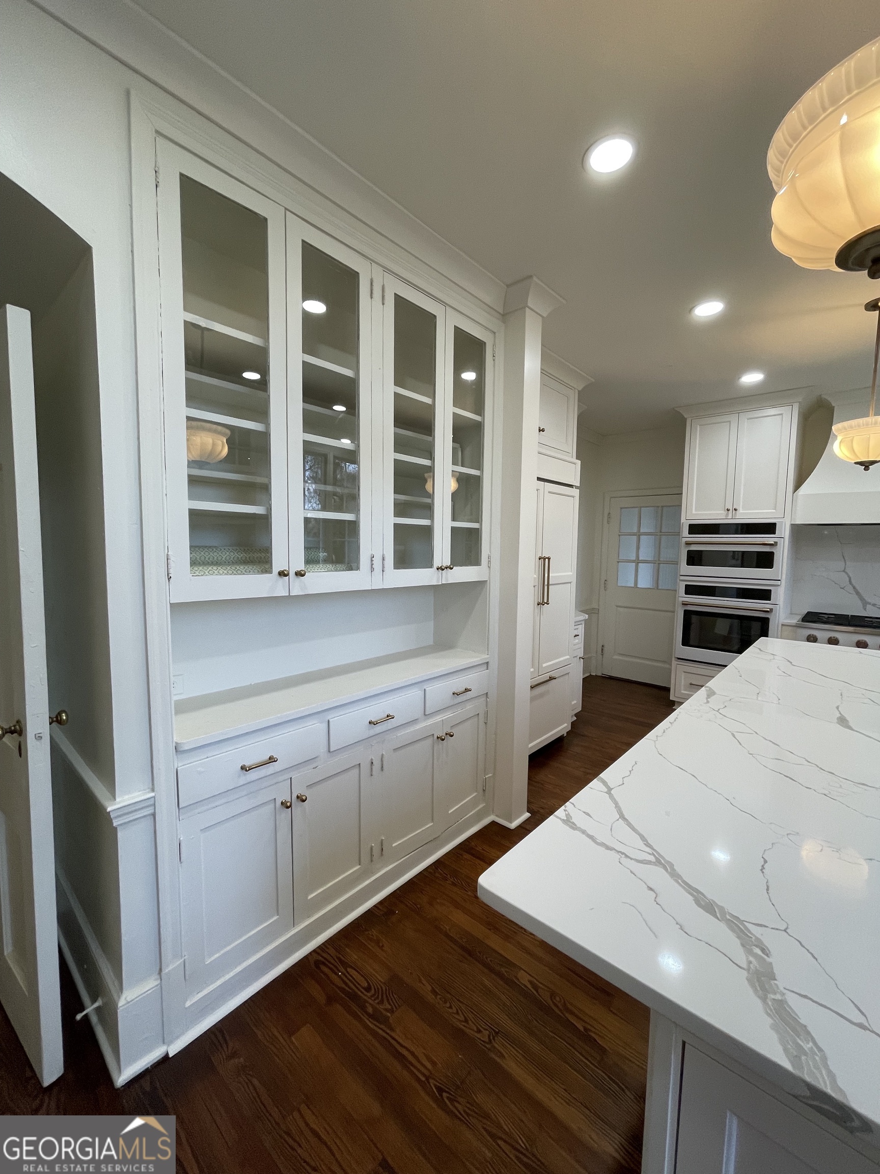 408 Thurston Avenue Thomaston, GA 30286 - Photo 15 of 51 a kitchen with a refrigerator and a stove top oven