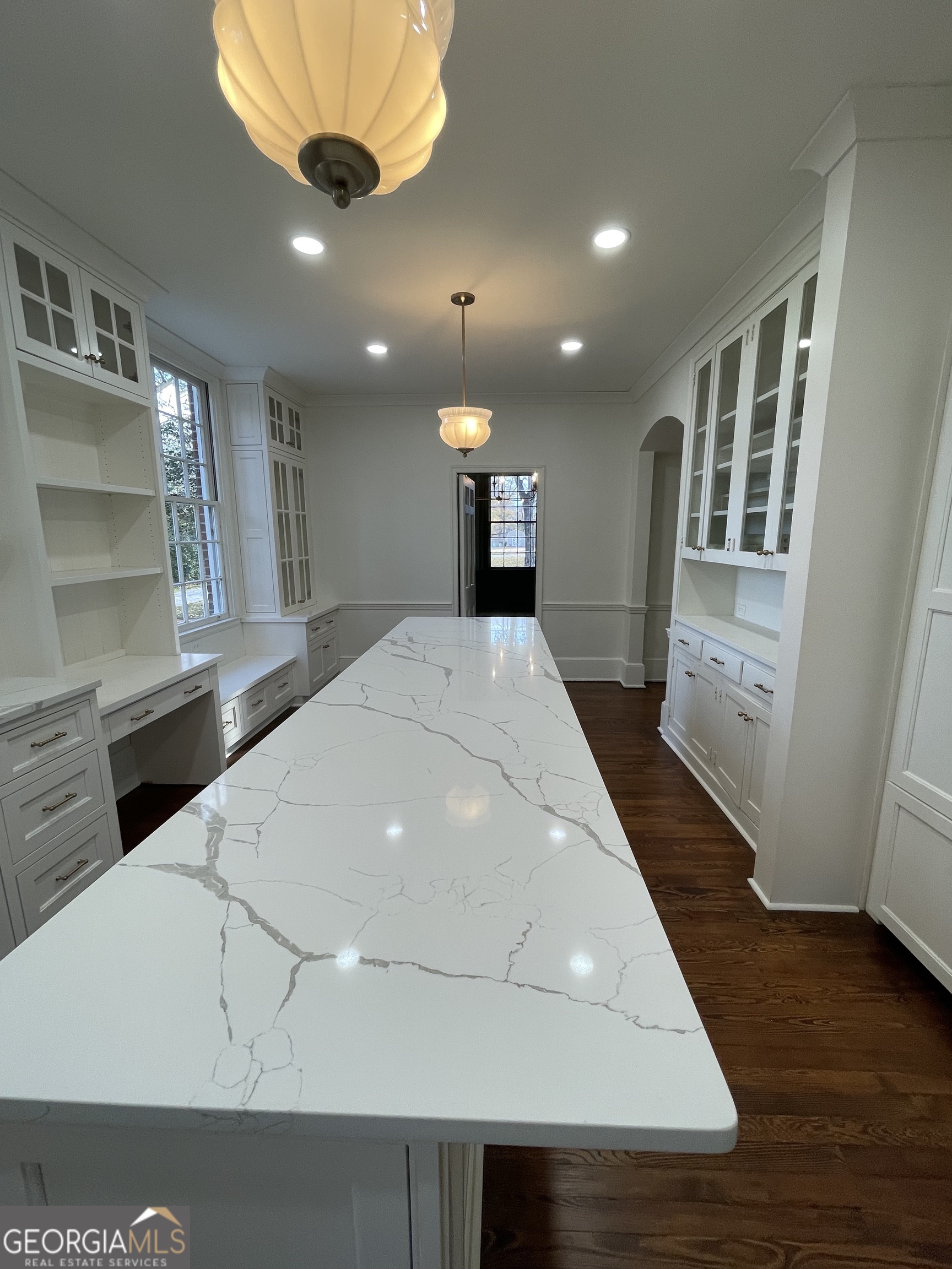 408 Thurston Avenue Thomaston, GA 30286 - Photo 17 of 51 a view of kitchen with cabinets and wooden floor