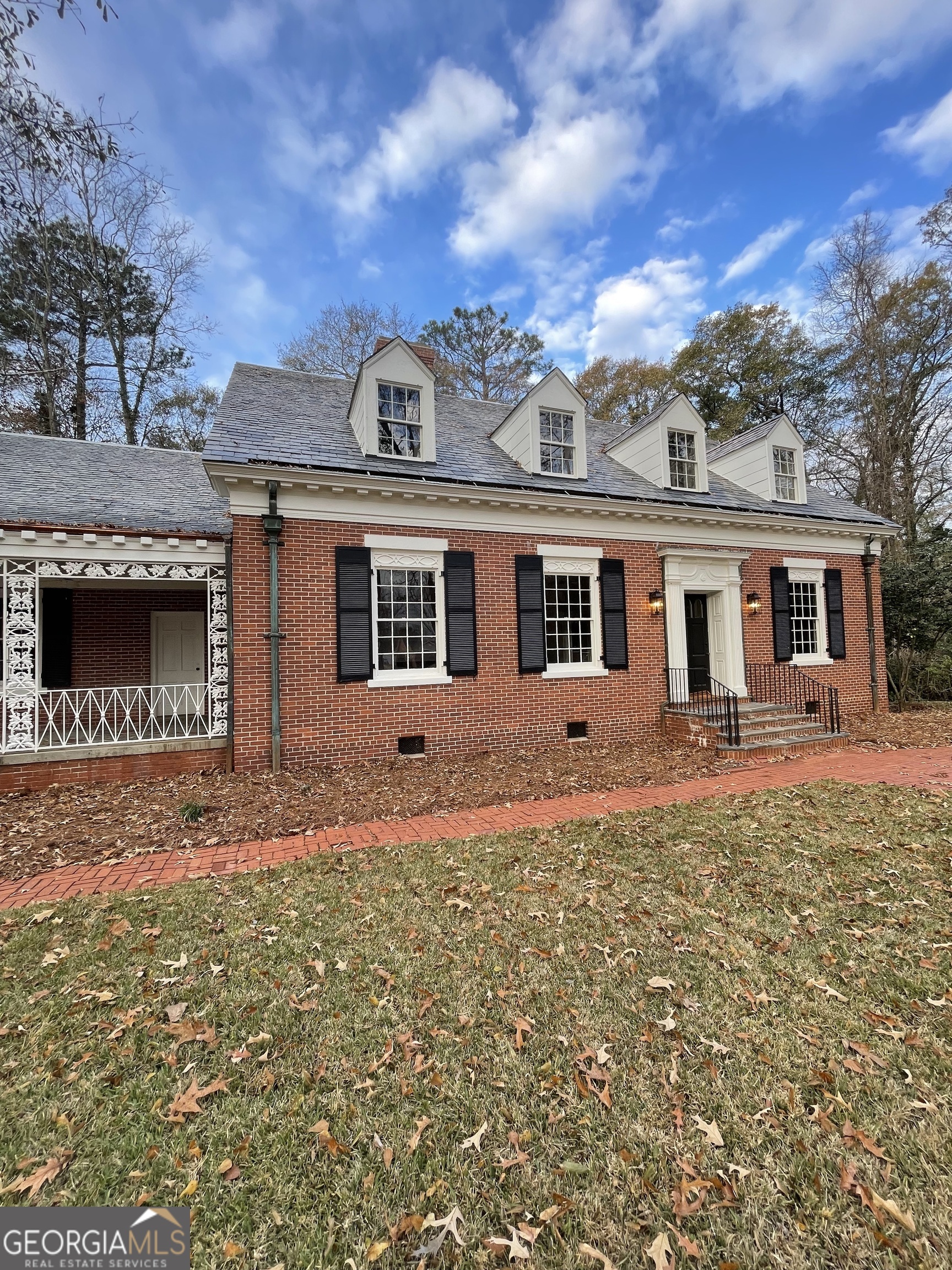 408 Thurston Avenue Thomaston, GA 30286 - Photo 2 of 51 a front view of a house with a yard